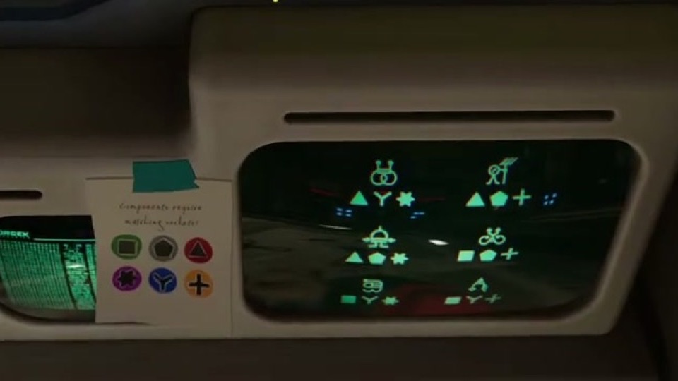 The green monitor with six drawings and their three shapes, next to the note with six coloured screw heads