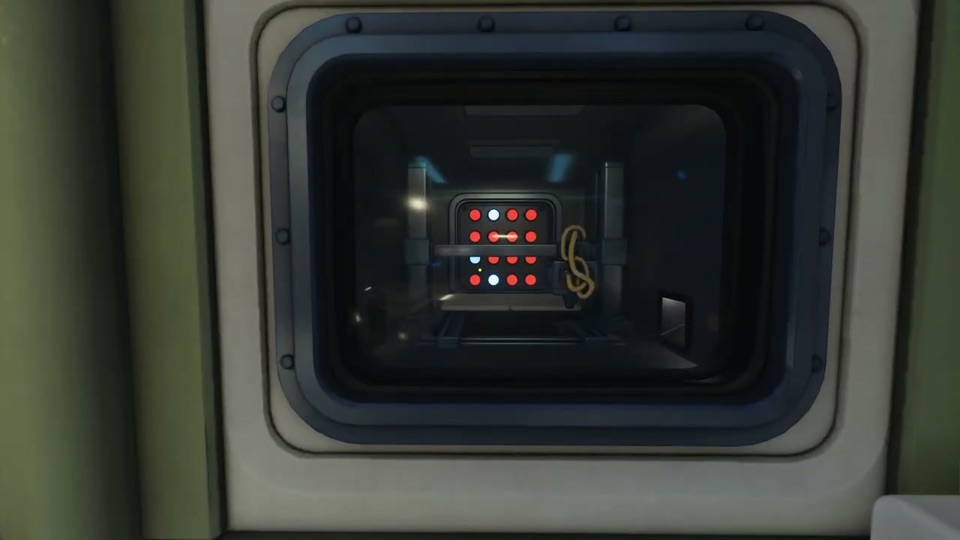 Through a window, the printer's 4x4 grid of red lights with a few white ones, a print-head bar across the grid and a coiled rope beside it