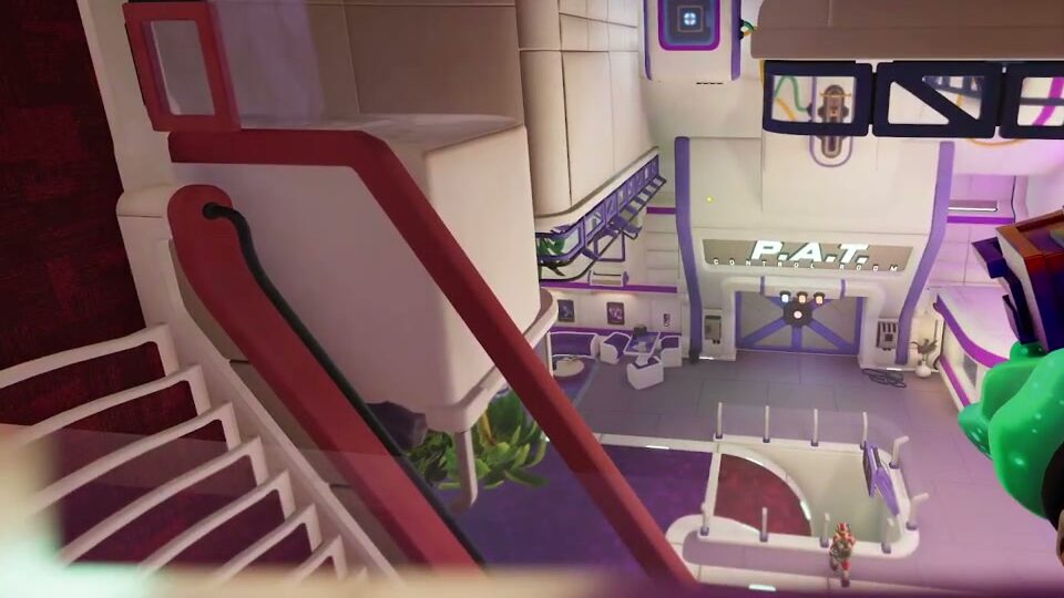The office lobby seen from a red staircase: a P.A.T. sign over a door, a white balcony below and the other explorer standing on the floor