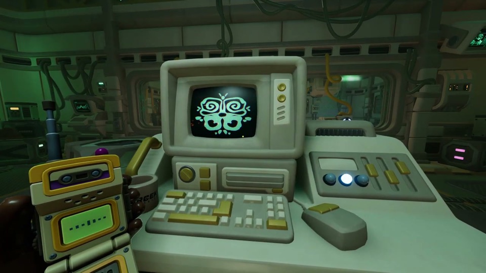 The yellow explorer's desk: an old computer showing an ornate emblem, with the middle of three blue buttons lit