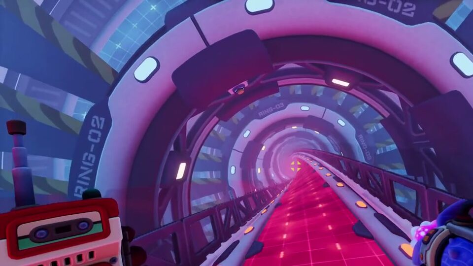 Inside the ring tunnel: a pink walkway runs through a line of rings, the nearest labelled RING-02 and the next RING-03