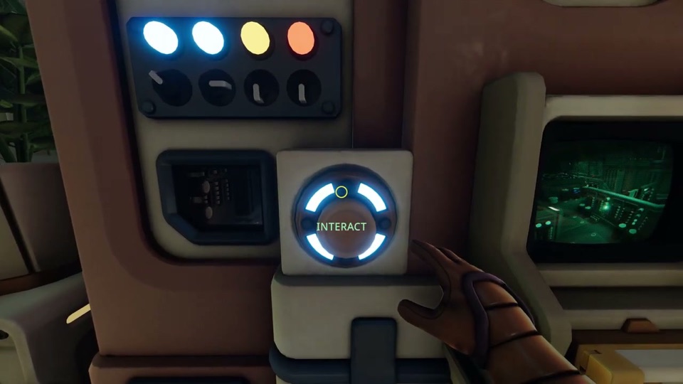 Close-up of the outside panel mid-solve: two lights blue-white, one yellow, one orange, with the player's hand on the big round button marked INTERACT