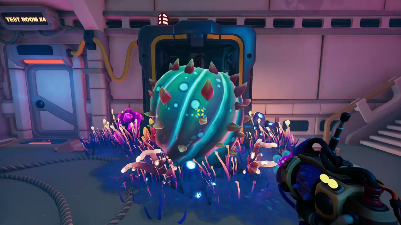 A giant teal spiked cactus blocking a doorway, with the TEST ROOM #4 sign on the wall to the left