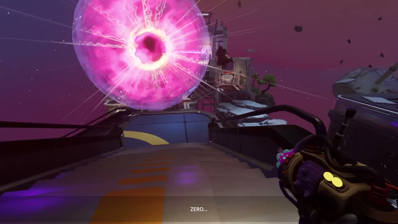 A huge pink crystal orb bursting with light over a walkway, the subtitle reading ZERO